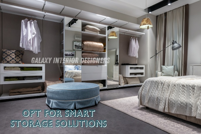 Smart storage bedroom wardrobe design by Galaxy Interior Designers in Chennai, offering space-saving interior solutions